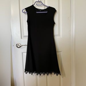 Tiana XS black cocktail dress with lace trim bottom. XS. A-line.